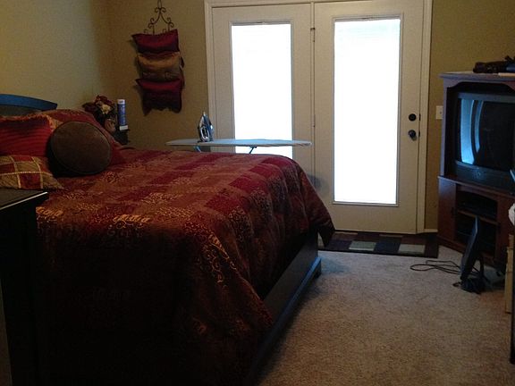 Master bedroom triple tray ceiling/ French door