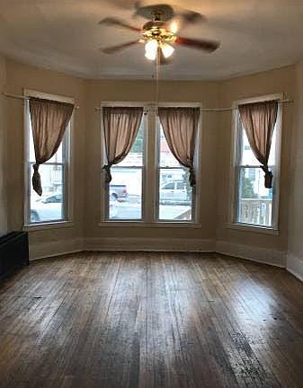 Living Room Unit #1 (lower unit) NEW blinds and curtains included