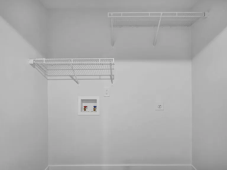 Washer and Dryer Hook Ups with vast storage space