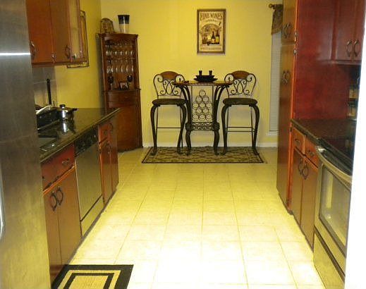 Newly Remodeled Kitchen With Stainless Steel Appliances and Granite Countertop