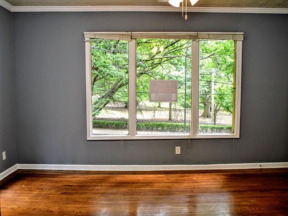 All hardwood floors and tall ceiling