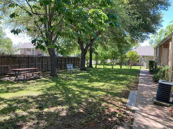 another view of the yard with walkup to the unit