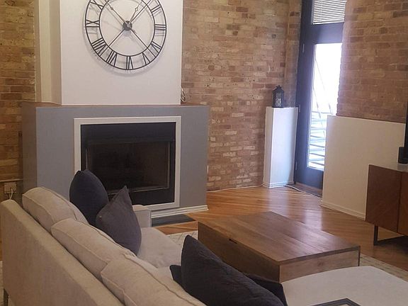 Living Room, Fireplace and Door to the deck.
