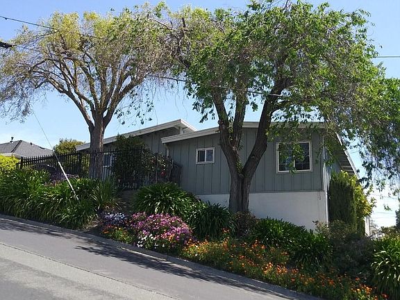 Beautifully landscaped corner lot.