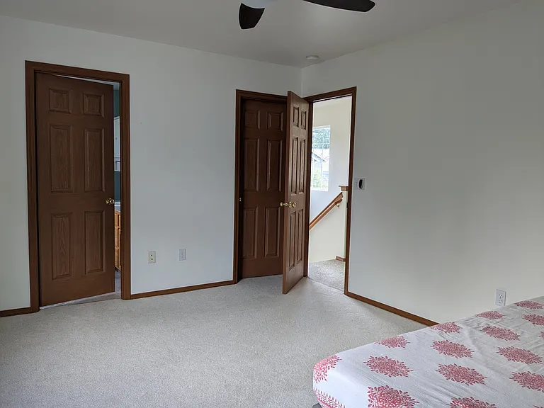 Master bed with walk in closet