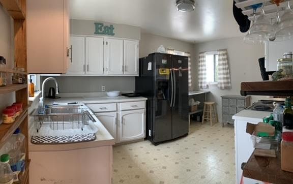kitchen - includes fridge, oven, stove, ad microwave