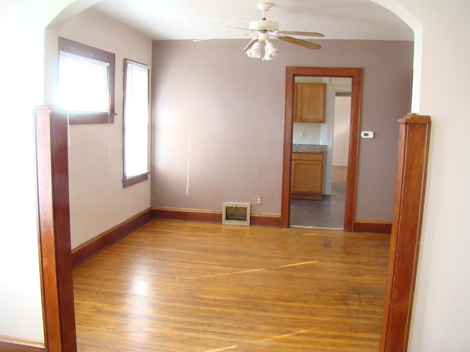 Living area one of two large living areas that are adjoined and flow into the kitchen and front bedroom.