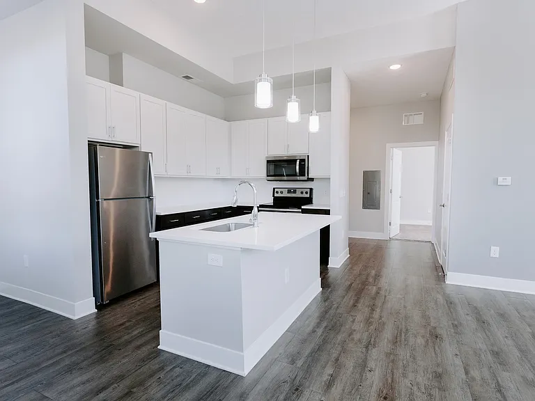 Experience the allure of modern design in this sleek and stylish kitchen.