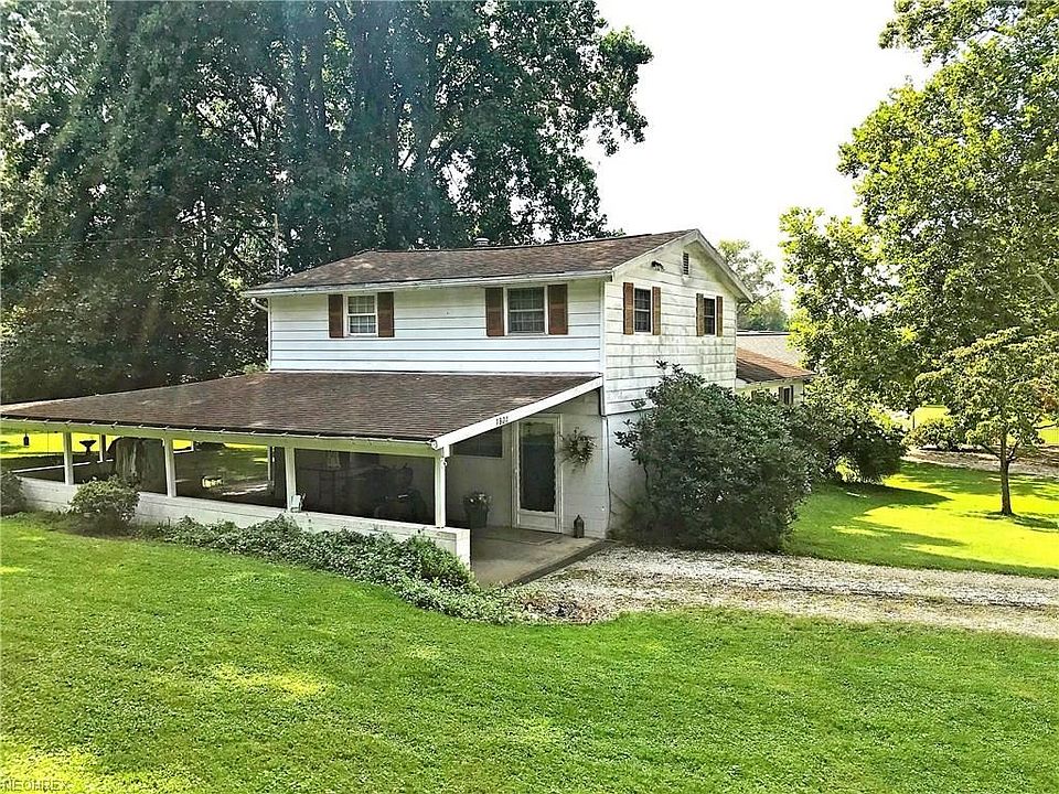 View from upper side of house and covered carport