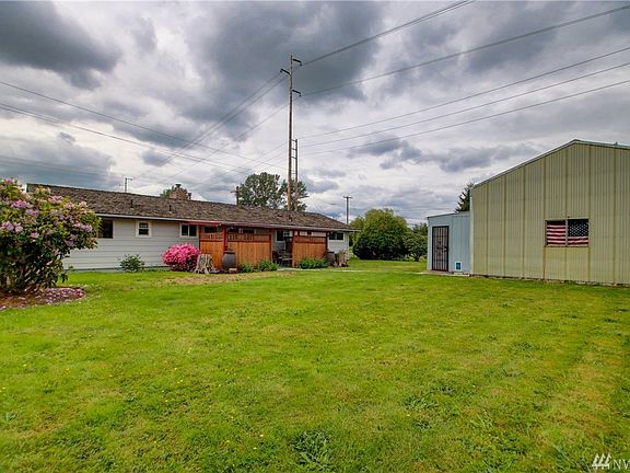 Large yard with room to grow and space for large garden. Soil is perfect for growing. 660Sqft Shop with attached extra storage shed.