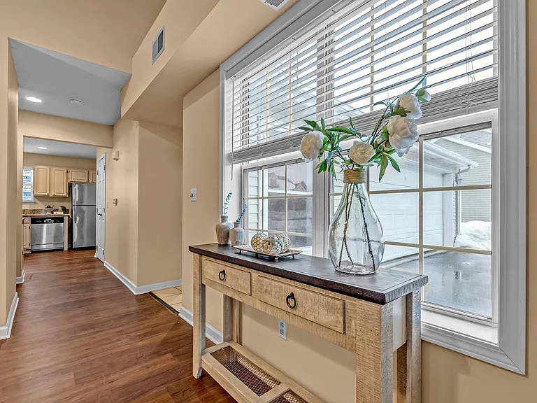 Bright Hallway with Wood Style Plank Flooring
