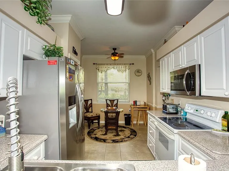 10275 Bismark Palm Way #MAIN — Photo 12