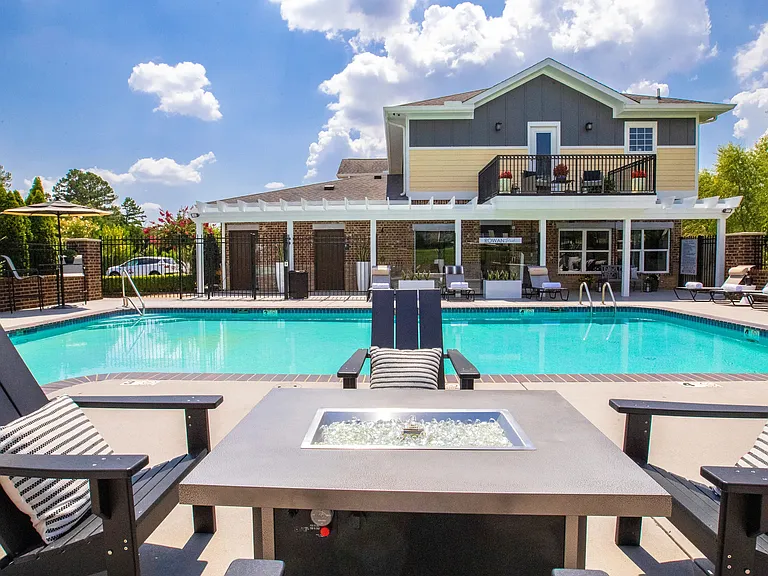 Unwind and warm up by the poolside fire pit, creating cozy moments and enhancing the overall poolside experience.