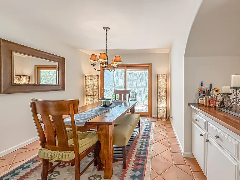 Formal dining area with bar