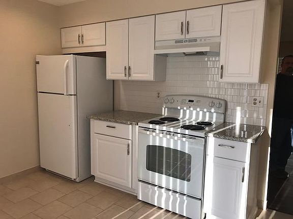 Newly renovated eat in-kitchen with granite countertops