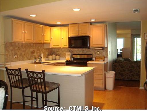 Plenty of cabinets, newer flooring!