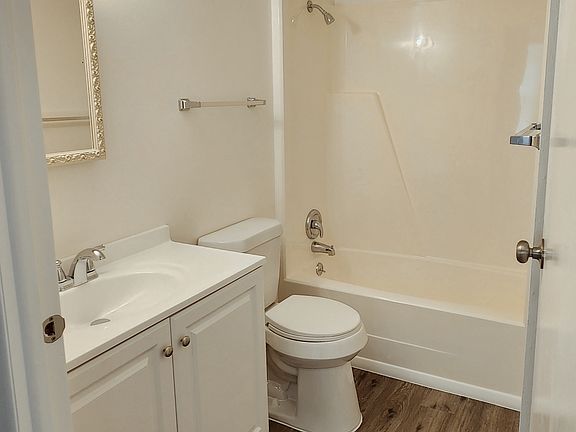 Bathroom with linen closet (not shown)