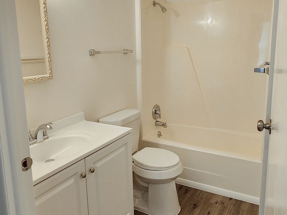 Bathroom with linen closet (not shown)