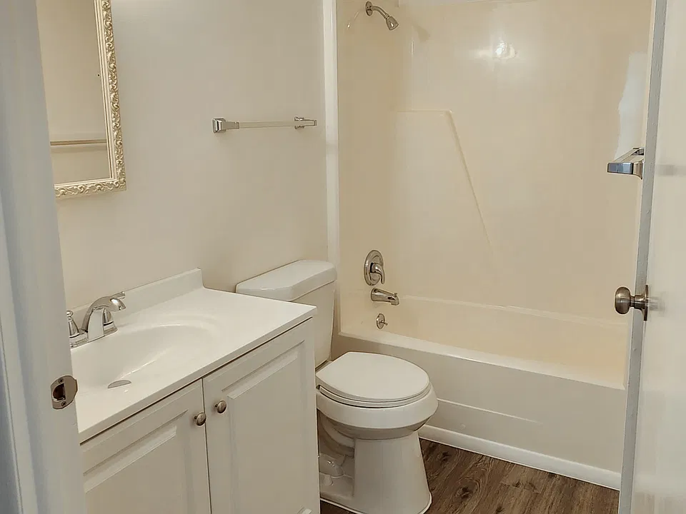 Bathroom with linen closet (not shown)
