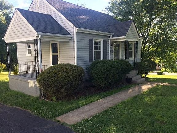 View of outside of home and the covered side porch/patio are
