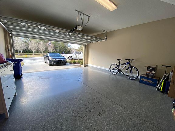 2 CAR GARAGE AND DRIVEWAY
