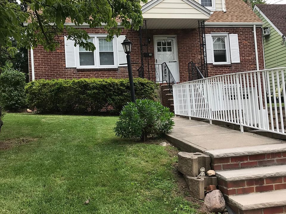 FRONT OF HOUSE WITH LANDSCAPING