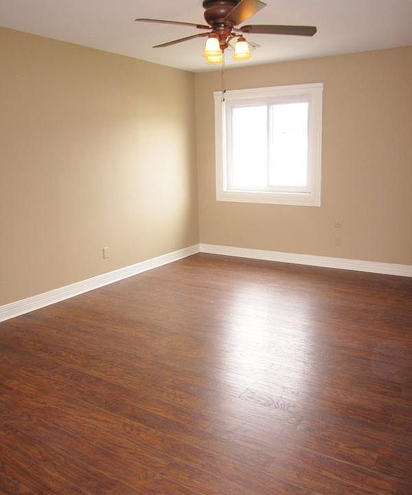 Spacious Living Room with hardwood floors