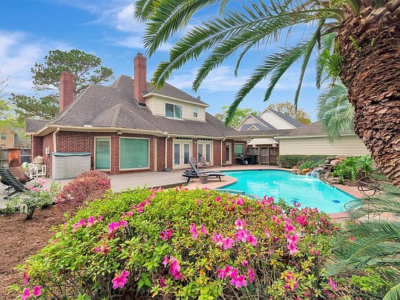 Take a peek at the beautiful backyard and pool!
