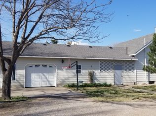 703 Huron St, Plains, KS 67869