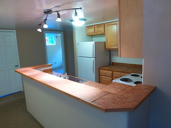 View from entry to bedroom and bathroom doors