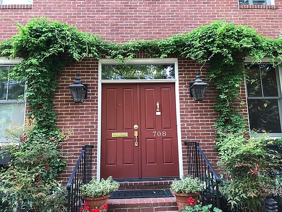Front door with gas lanterns