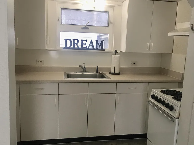Charming kitchen space. Fridge out of picture to the left.