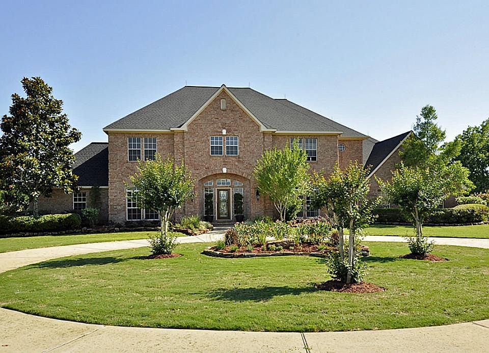 THIS HOME SITS ON 4.74 WOODED RIVER FRONT ACREAGE. PLEASE BE SURE TO LOOK AT THE VIRTUAL TOURS ALSO.
