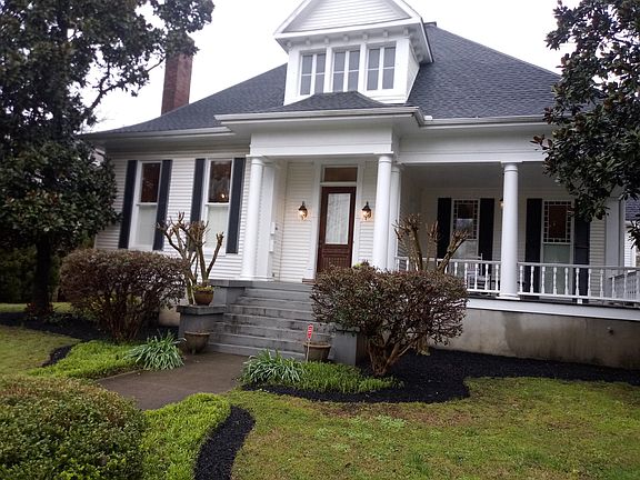Front entrance and covered porch.