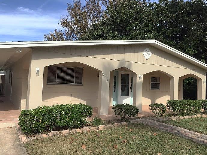 FRONT OF HOME W/ FRONT PORCH