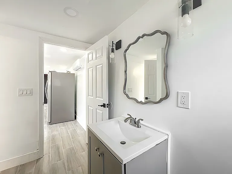 6920 Delano Ave — Photo 12