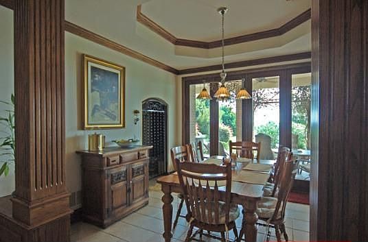 Breakfast Area overlooking the backyard, pool area and coy pond.
