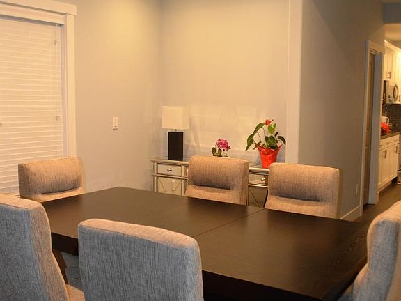 Dining area with new hardwood table.