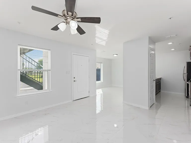 Downstairs no balcony, view of kitchen, pantry and dining area.
