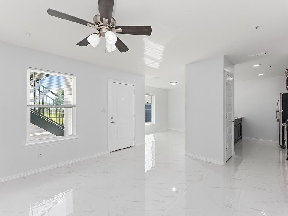 Downstairs no balcony, view of kitchen, pantry and dining area.