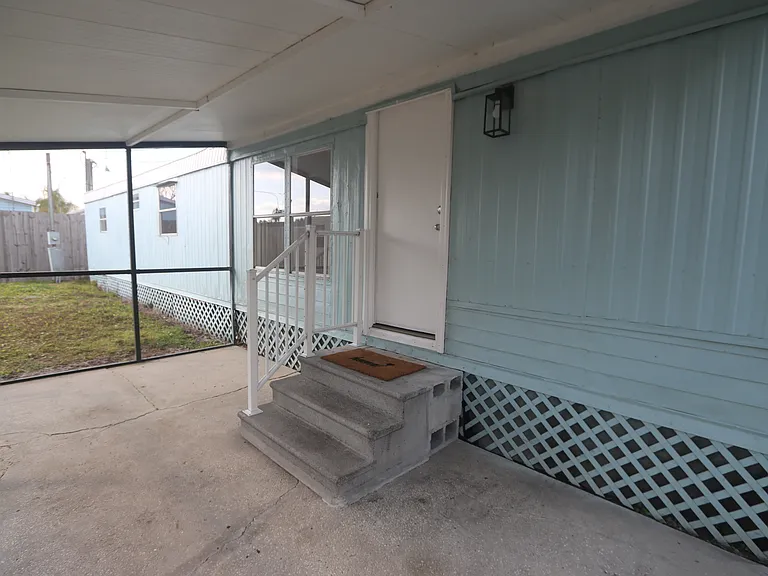 Large patio with screened-in lanai.