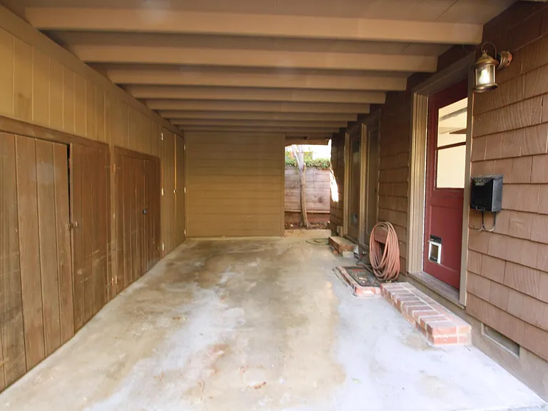 Private attached covered parking with storage
