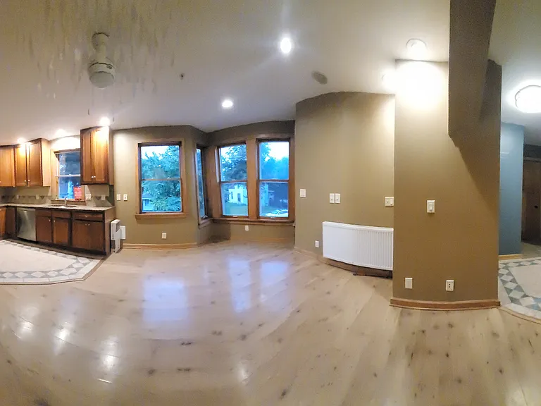 Panoramic into kitchen and bdrm.hall