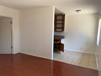 Living room into the dining and kitchen area