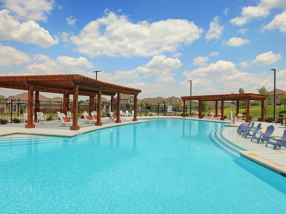 Experience leisure with a pristine pool, stylish wooden pergolas, and plush seating at Thompson Farm