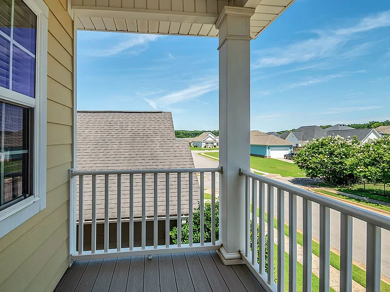Balcony has a view of neighborhood