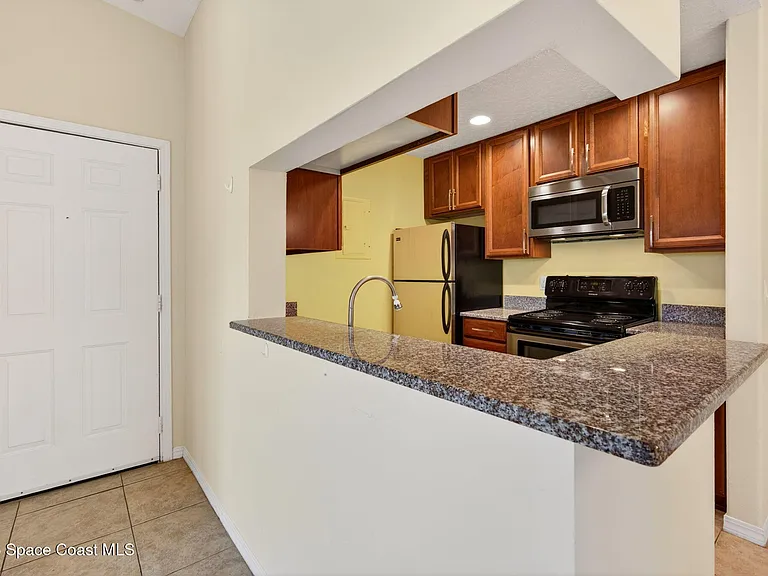 7667 N Wickham Rd #219 — Photo 8