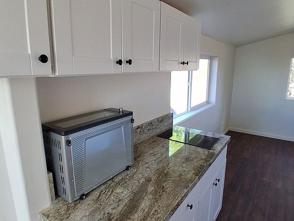 Kitchen cabinets with double burners and space saving oven/air fryer etc
