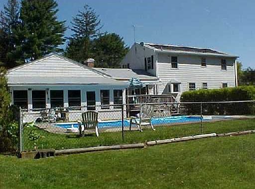 Rear/ note solar pool heater on roof