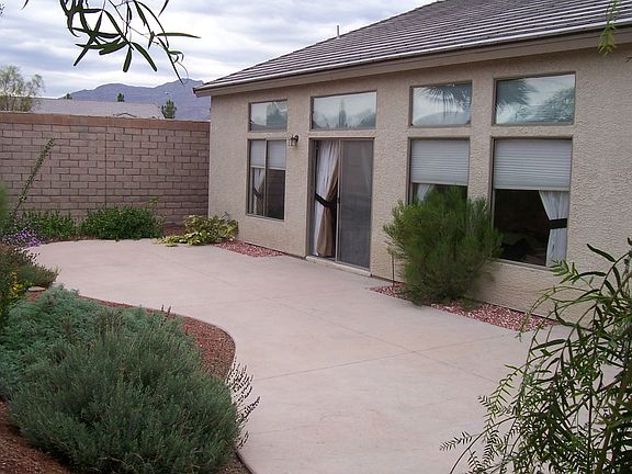 Maintenance free, professionally landscaped front and rear yard!